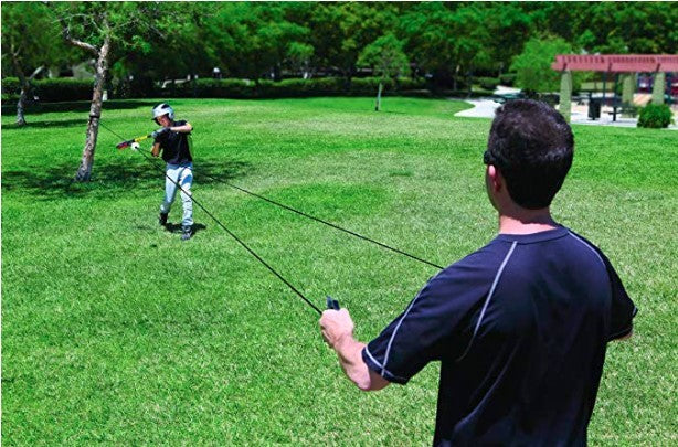 Drawstring baseball hit training device